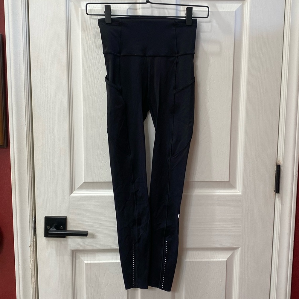 Lulu lemon 21” highrise. Size 2 black with pockets